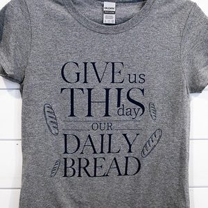 Gray T-shirt with inspirational text about daily bread.