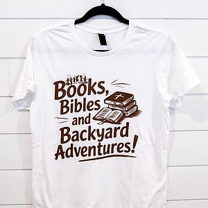 White T-shirt with a nature-themed adventure phrase in brown text.