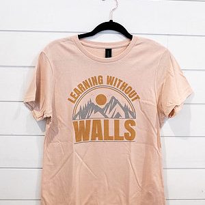 Light pink T-shirt with 'Leading Without Walls' graphic design.