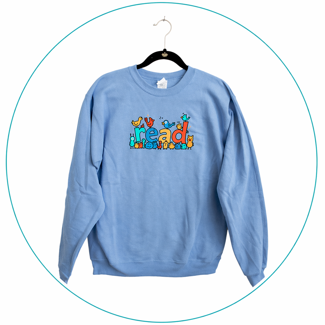 Blue sweatshirt with colorful "read" design.